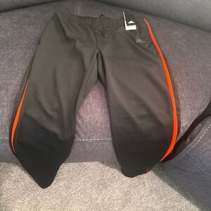 Adidas Black Track Pants with Vibrant Orange Stripes